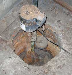 Old sump pump in floor