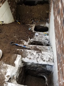 Layered foundation pits
