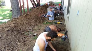 Men working in foundation holes