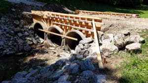 Wooden mold for concrete bridge over drainage ditch