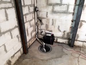 Sump pump installation in floor