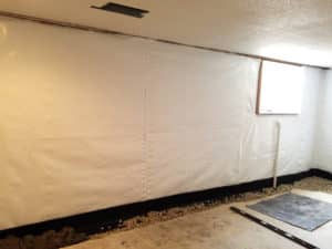 Waterproofed basement wall